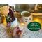 This image shows the battery-operated candle included in your purchase. The candle lights up the carved elf face and has a timer setting.